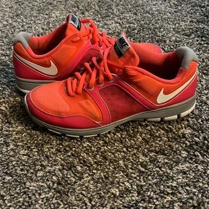 Women’s size 6 orange-ish Nike Training Free CT Motion Fit sneaker